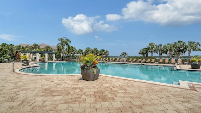 1114 Bearing Ct, Bradenton, FL 34208 - community pool featuring a patio area
