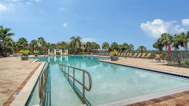 1114 Bearing Ct, Bradenton, FL 34208 - community pool featuring a patio