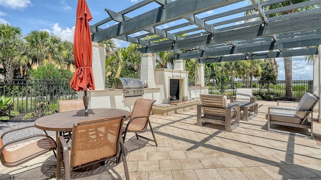 1114 Bearing Ct, Bradenton, FL 34208 - view of patio / terrace featuring an outdoor kitchen, outdoor dining area, and a pergola