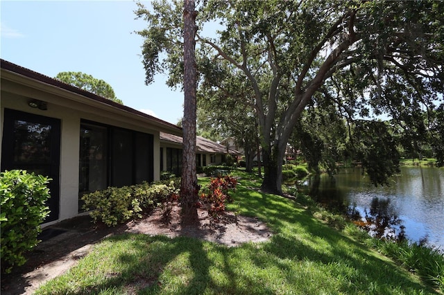 3376 Sandleheath Unit 9, Sarasota, FL 34235 - view of yard with a water view