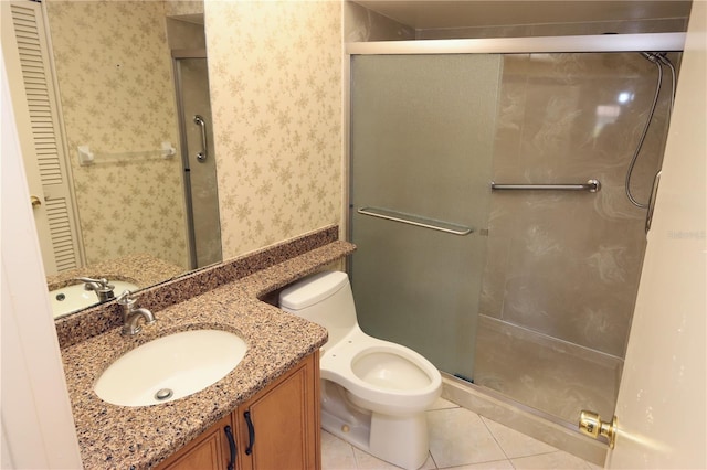 3376 Sandleheath Unit 9, Sarasota, FL 34235 - full bath featuring vanity, a shower stall, tile patterned flooring, and wallpapered walls