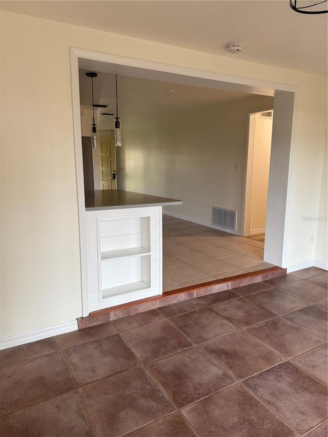4424 Coco Ridge Cir, Sarasota, FL 34233 - unfurnished living room with tile patterned floors