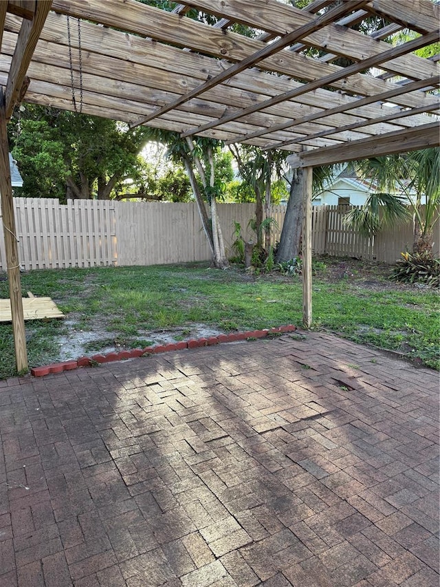 4424 Coco Ridge Cir, Sarasota, FL 34233 - fenced backyard featuring a patio area and a pergola