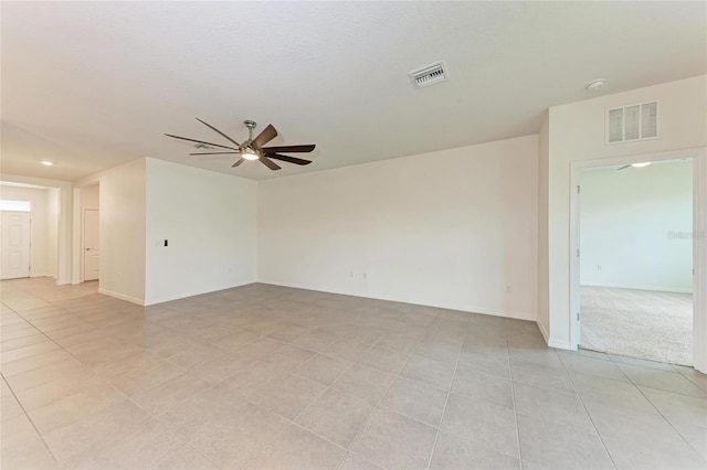13829 Camden Crest Ter, Bradenton, FL 34211 - spare room with ceiling fan and light tile patterned floors
