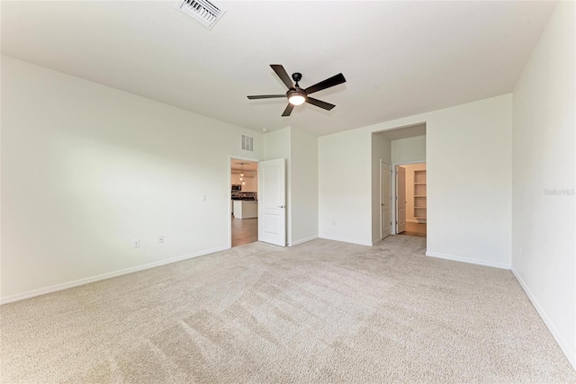 13829 Camden Crest Ter, Bradenton, FL 34211 - unfurnished bedroom featuring light colored carpet and a ceiling fan
