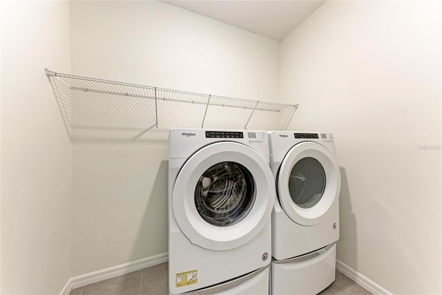 13829 Camden Crest Ter, Bradenton, FL 34211 - laundry room featuring washer and clothes dryer and baseboards