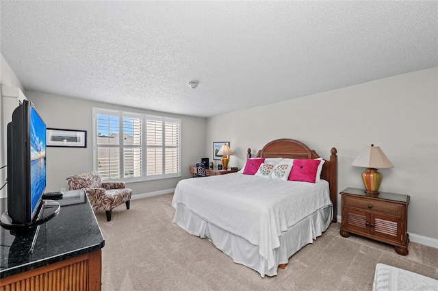 6480 Midnight Pass Rd Unit 503, Sarasota, FL 34242 - bedroom featuring light colored carpet and a textured ceiling