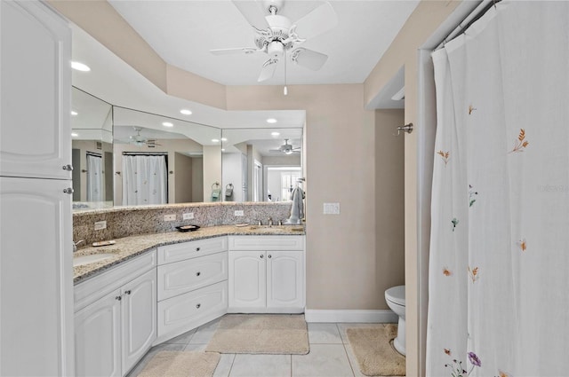 6480 Midnight Pass Rd Unit 503, Sarasota, FL 34242 - full bath featuring a ceiling fan, double vanity, tile patterned floors, and recessed lighting