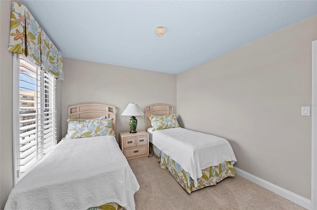 6480 Midnight Pass Rd Unit 503, Sarasota, FL 34242 - carpeted bedroom featuring baseboards
