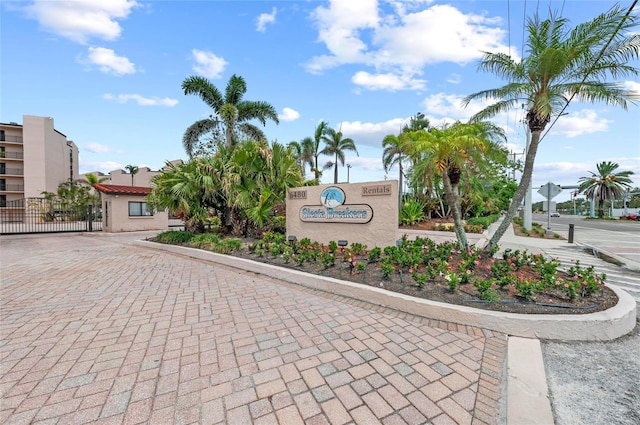 6480 Midnight Pass Rd Unit 503, Sarasota, FL 34242 - community / neighborhood sign featuring a gate and decorative driveway