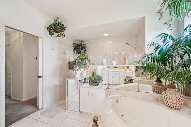 4173 Beach View Ct, Port Charlotte, FL 33948 - bathroom with vanity, a tub with jets, and tile patterned flooring