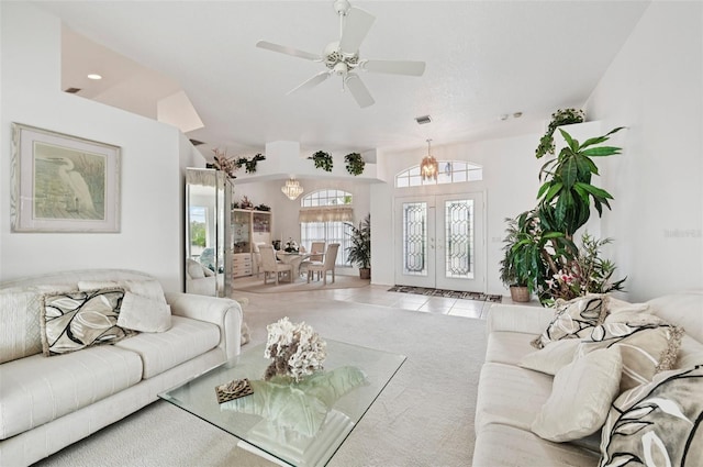 4173 Beach View Ct, Port Charlotte, FL 33948 - carpeted living area with a ceiling fan, tile patterned floors, and french doors