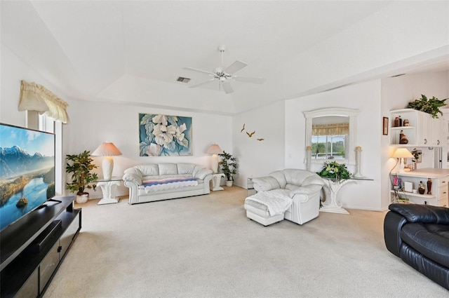 4173 Beach View Ct, Port Charlotte, FL 33948 - carpeted living room with a ceiling fan and a raised ceiling