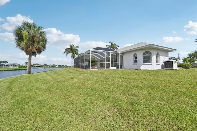 4173 Beach View Ct, Port Charlotte, FL 33948 - view of green lawn featuring a water view