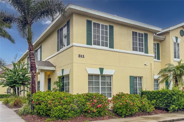 311 Cape Harbour Loop Unit 101, Bradenton, FL 34212 - view of home's exterior featuring stucco siding