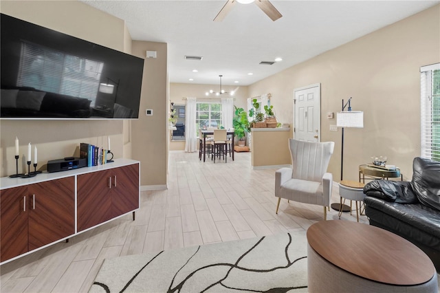 311 Cape Harbour Loop Unit 101, Bradenton, FL 34212 - living room with ceiling fan and recessed lighting