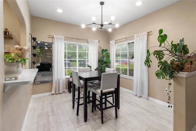 311 Cape Harbour Loop Unit 101, Bradenton, FL 34212 - dining space with a chandelier, recessed lighting, and light wood finished floors