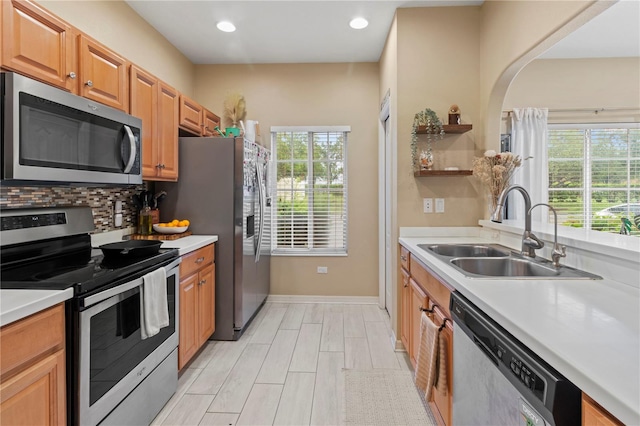 311 Cape Harbour Loop Unit 101, Bradenton, FL 34212 - kitchen featuring stainless steel appliances, plenty of natural light, light countertops, and recessed lighting