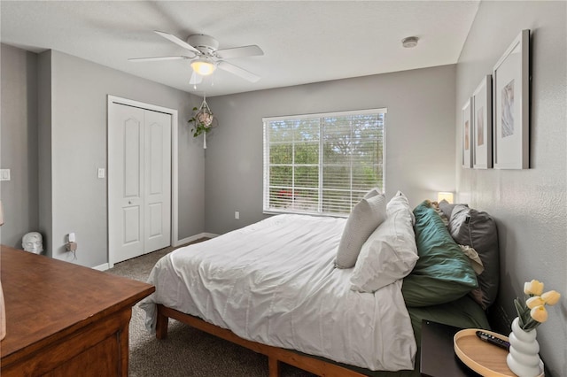 311 Cape Harbour Loop Unit 101, Bradenton, FL 34212 - carpeted bedroom featuring a closet and a ceiling fan