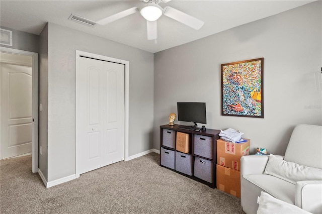 311 Cape Harbour Loop Unit 101, Bradenton, FL 34212 - living area featuring carpet and ceiling fan