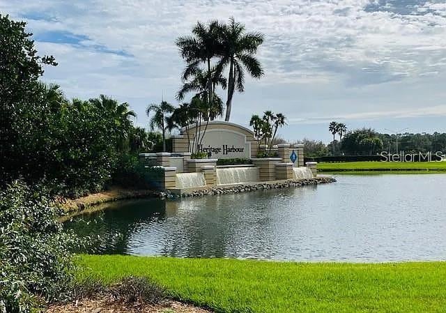 311 Cape Harbour Loop Unit 101, Bradenton, FL 34212 - community / neighborhood sign featuring a water view