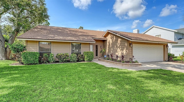 8103 11th Ave NW, Bradenton, FL 34209 - view of front of house with a garage, concrete driveway, and a front yard