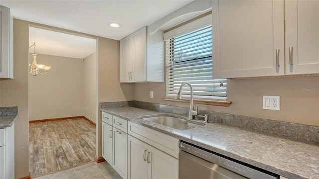8103 11th Ave NW, Bradenton, FL 34209 - kitchen featuring dishwasher, white cabinets, and recessed lighting