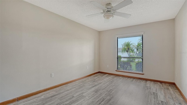 8103 11th Ave NW, Bradenton, FL 34209 - spare room with light wood-style flooring, a textured ceiling, and a ceiling fan