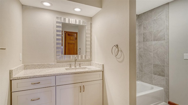 8103 11th Ave NW, Bradenton, FL 34209 - bathroom featuring vanity, shower / tub combination, and recessed lighting