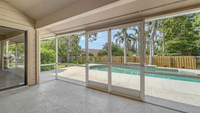 8103 11th Ave NW, Bradenton, FL 34209 - doorway to outside featuring lofted ceiling