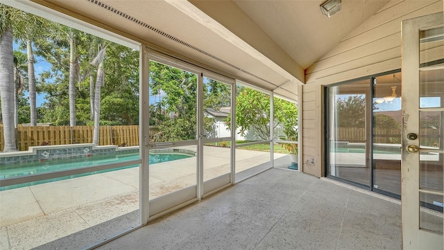 8103 11th Ave NW, Bradenton, FL 34209 - unfurnished sunroom with lofted ceiling