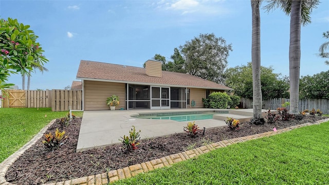 8103 11th Ave NW, Bradenton, FL 34209 - view of pool featuring a sunroom, a patio area, a fenced backyard, and a gate