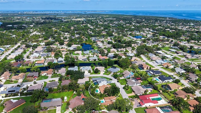 8103 11th Ave NW, Bradenton, FL 34209 - aerial view of property and surrounding area with nearby suburban area and a nearby body of water