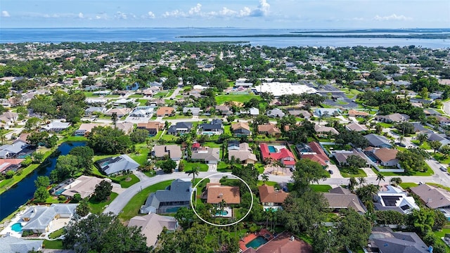 8103 11th Ave NW, Bradenton, FL 34209 - aerial overview of property's location with nearby suburban area and a nearby body of water