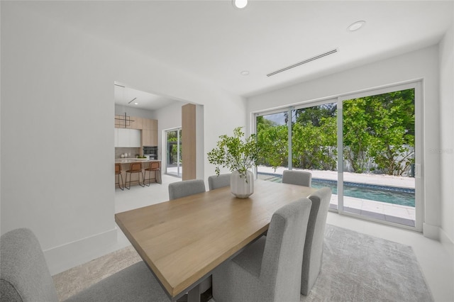 3500 Bay Shore Rd, Sarasota, FL 34234 - dining space featuring recessed lighting