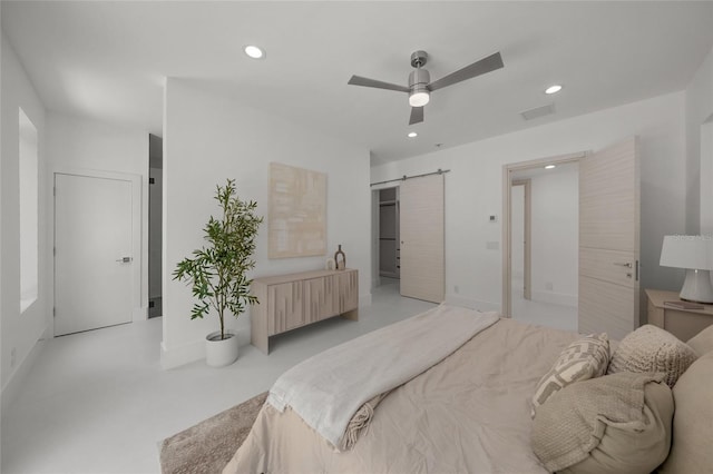 3500 Bay Shore Rd, Sarasota, FL 34234 - bedroom with a barn door, recessed lighting, and a ceiling fan