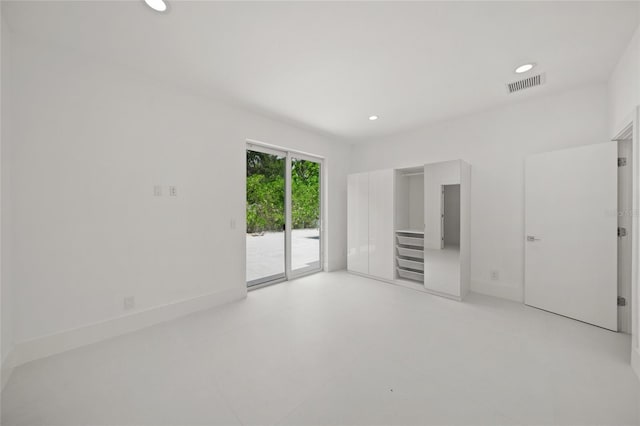 3500 Bay Shore Rd, Sarasota, FL 34234 - unfurnished bedroom with access to exterior and recessed lighting