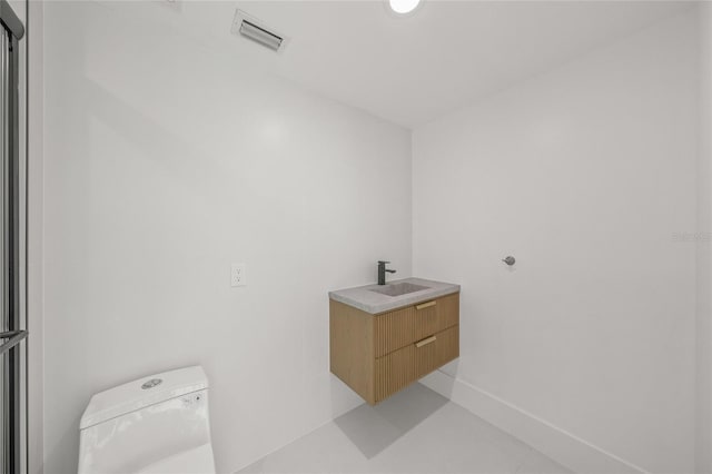 3500 Bay Shore Rd, Sarasota, FL 34234 - bathroom featuring vanity and toilet