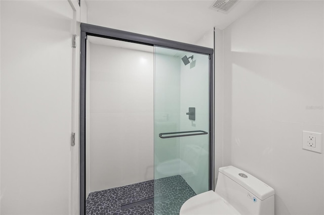 3500 Bay Shore Rd, Sarasota, FL 34234 - bathroom featuring a stall shower and toilet