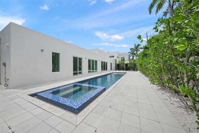3500 Bay Shore Rd, Sarasota, FL 34234 - view of pool featuring a patio and a pool with connected hot tub