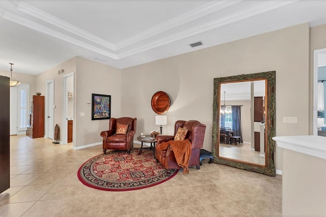 6305 Golden Eye Gln, Lakewood Ranch, FL 34202 - sitting room with light tile patterned flooring, ornamental molding, and a chandelier