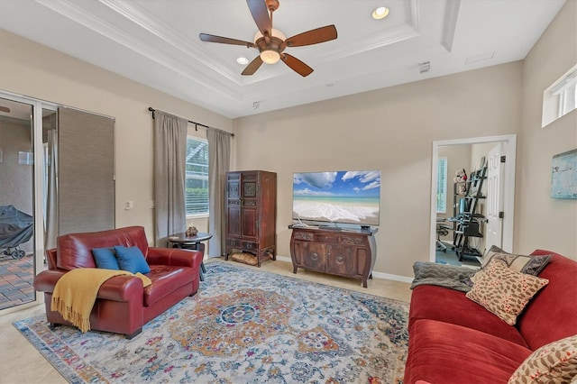 6305 Golden Eye Gln, Lakewood Ranch, FL 34202 - living area featuring a tray ceiling, a ceiling fan, ornamental molding, and recessed lighting
