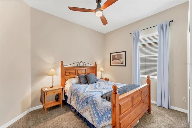 6305 Golden Eye Gln, Lakewood Ranch, FL 34202 - carpeted bedroom with baseboards and a ceiling fan
