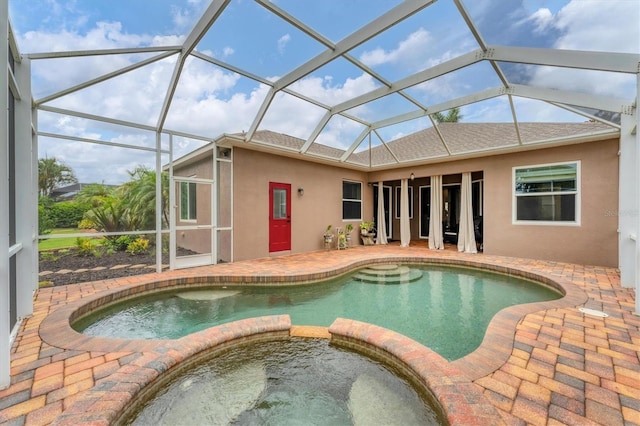 6305 Golden Eye Gln, Lakewood Ranch, FL 34202 - view of swimming pool with a patio, a pool with connected hot tub, and a lanai