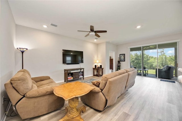 12357 Nantahala Run, Parrish, FL 34219 - living area with light wood-style floors, a ceiling fan, and recessed lighting