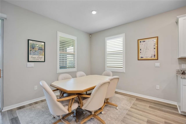 12357 Nantahala Run, Parrish, FL 34219 - dining room featuring light wood-style flooring and recessed lighting