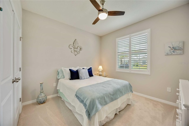 12357 Nantahala Run, Parrish, FL 34219 - bedroom with carpet floors and a ceiling fan