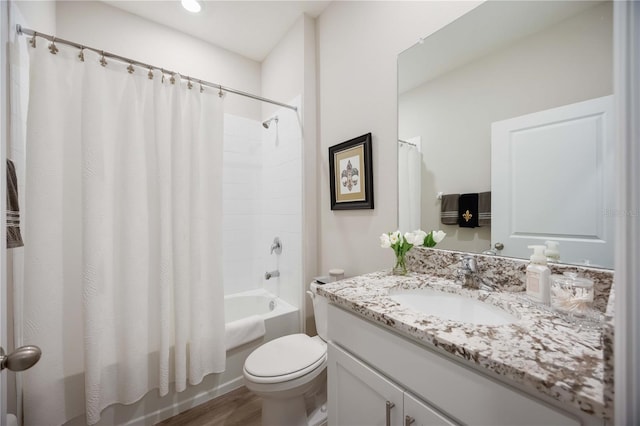 12357 Nantahala Run, Parrish, FL 34219 - bathroom with vanity, shower / bath combo, and wood finished floors