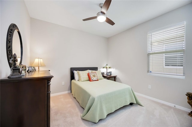 12357 Nantahala Run, Parrish, FL 34219 - bedroom with light colored carpet and a ceiling fan