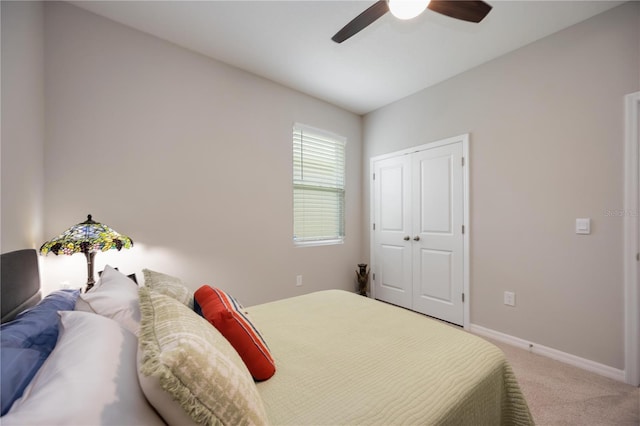 12357 Nantahala Run, Parrish, FL 34219 - bedroom featuring light carpet, a closet, and a ceiling fan